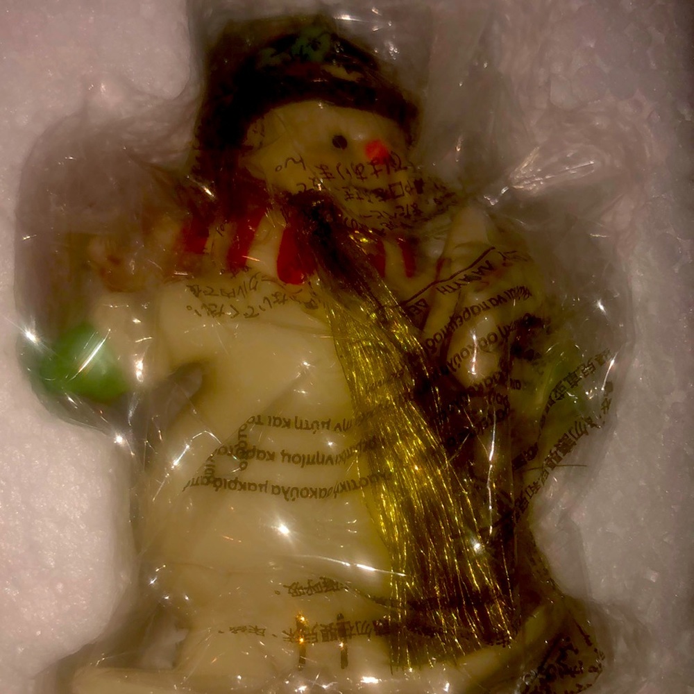 Lenox snowman on ski’s. It’s one out of a set of 5